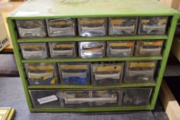 Small storage unit containing various fuses, auto-electrical fittings etc