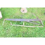 Mixed lot of vintage tools to include a scythe, a two-man saw etc