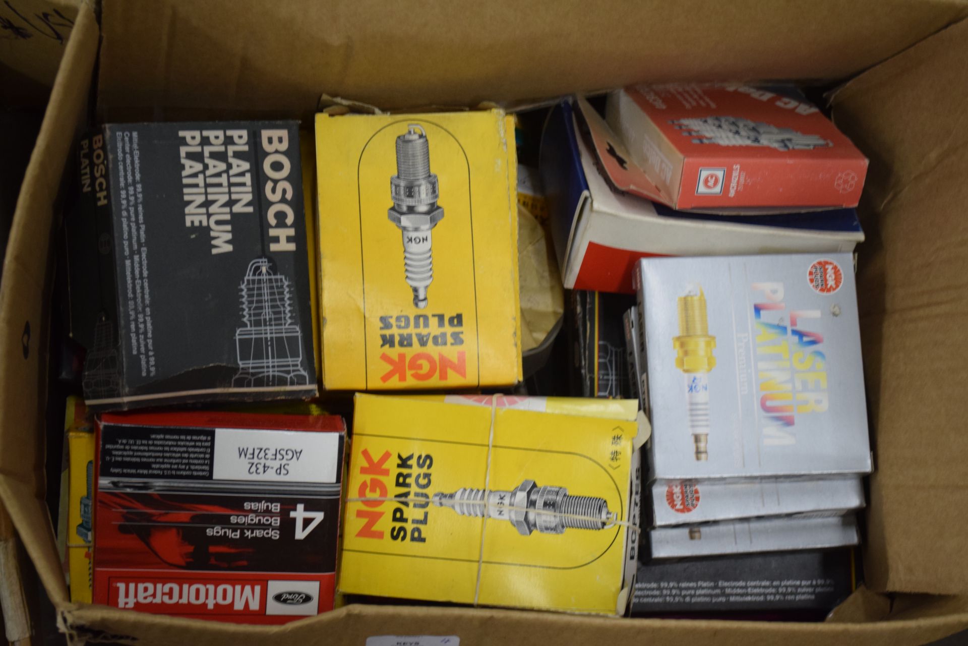 Four boxes of auto spares including Lockheed wheel bearings, Bosch spark plugs etc - Image 2 of 5