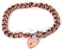 Antique 9c stamped rose coloured curb link bracelet, heart padlock and safety chain fitting, 14.2gms