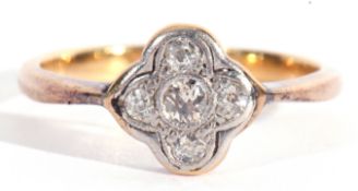 Antique five stone diamond ring, the shield shaped plaque centring an old cut diamond in a