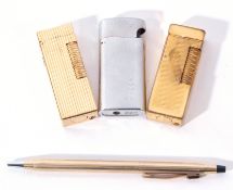 Mixed Lot: two Dunhill lighters, a ribbed example with patent no USRE24163, a cricket vintage