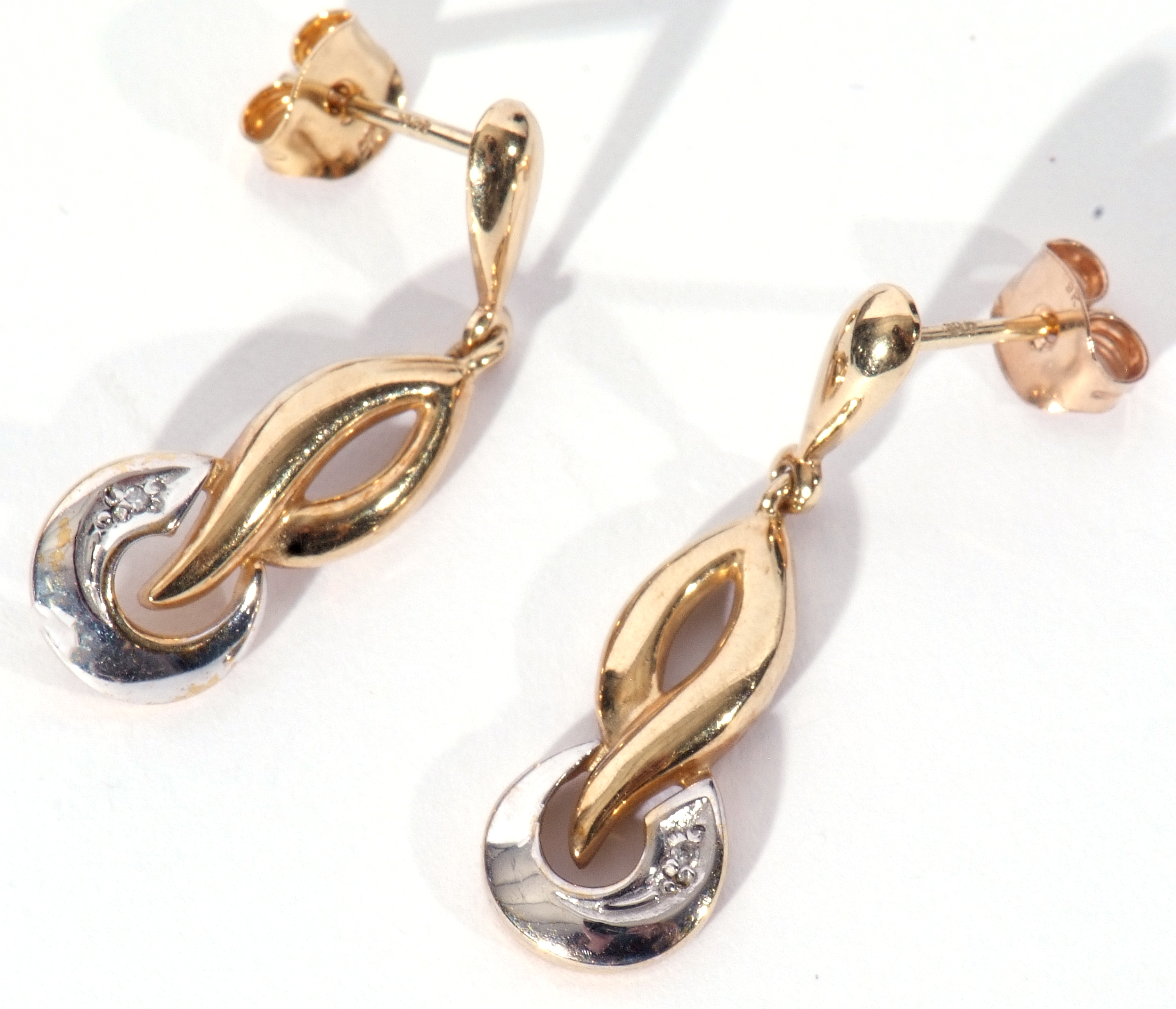 Pair of modern 9ct two-tone gold earrings in a stylised design, each highlighted with a small single - Image 4 of 7