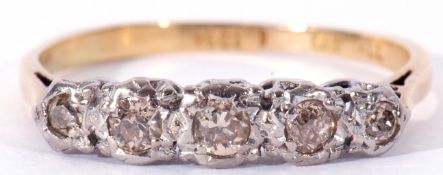 Antique five stone diamond ring featuring five graduated old cut diamonds, each individually claw