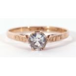9ct gold paste set ring, the round centre stone raised between chased shoulders, size P