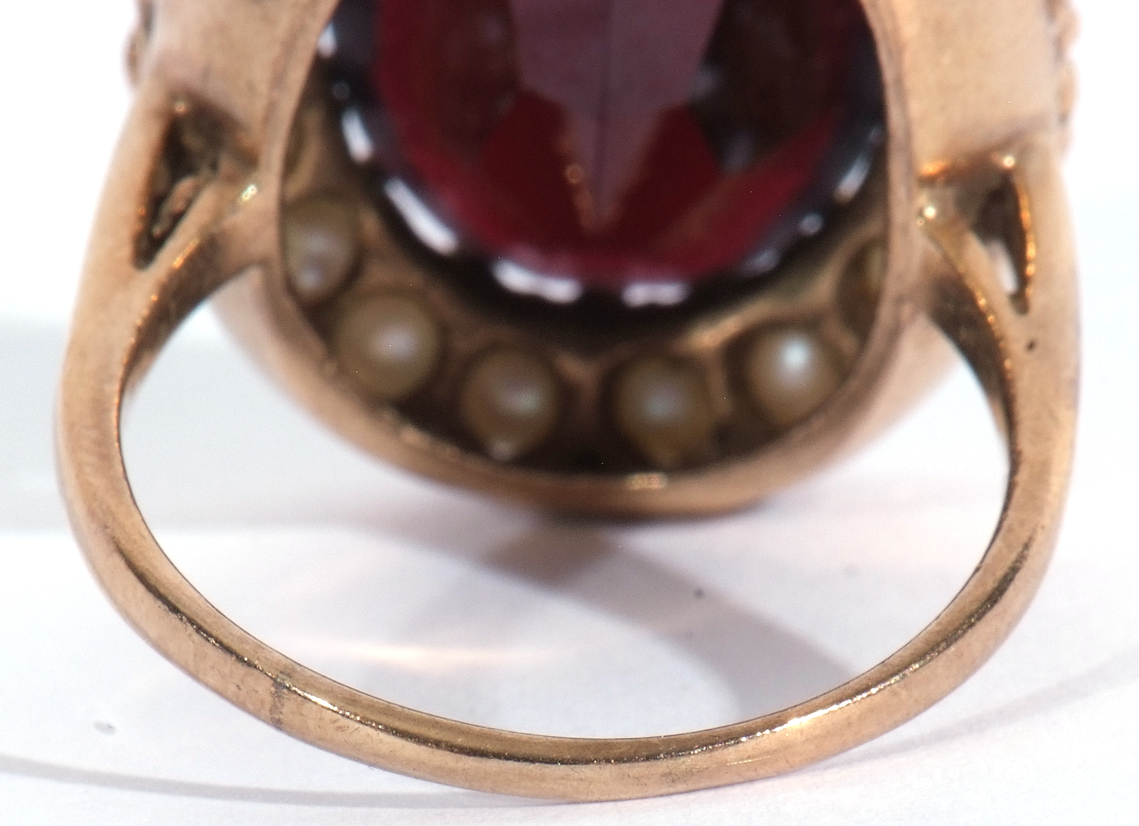 Modern 9ct gold dress ring, a large red paste faceted stone, 18 x 12mm, within a seed pearl - Image 6 of 9