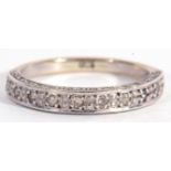 Diamond set half eternity ring featuring ten small single cut diamonds, stamped 9ct, size L