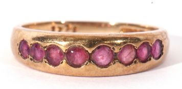 9ct gold ruby ring featuring eight small round cut rubies, size N