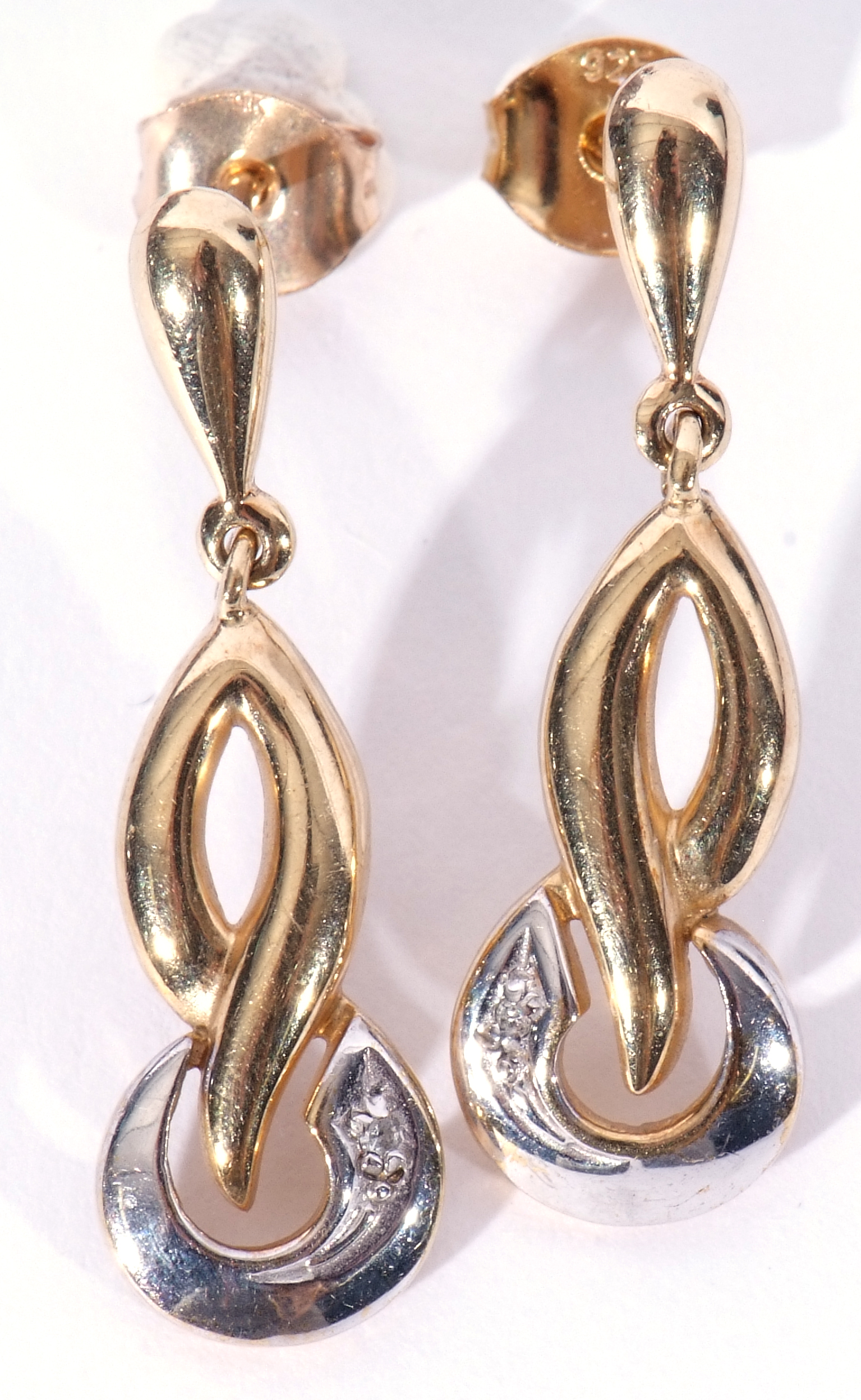 Pair of modern 9ct two-tone gold earrings in a stylised design, each highlighted with a small single - Image 5 of 7
