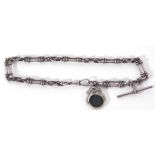 Antique silver watch chain, a trombone and knotted link design with T-bar clip and swivel fob, g/w