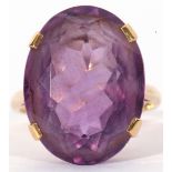 Large amethyst dress ring, the oval faceted amethyst 20 x 15mm, four claw set in a basket mount,