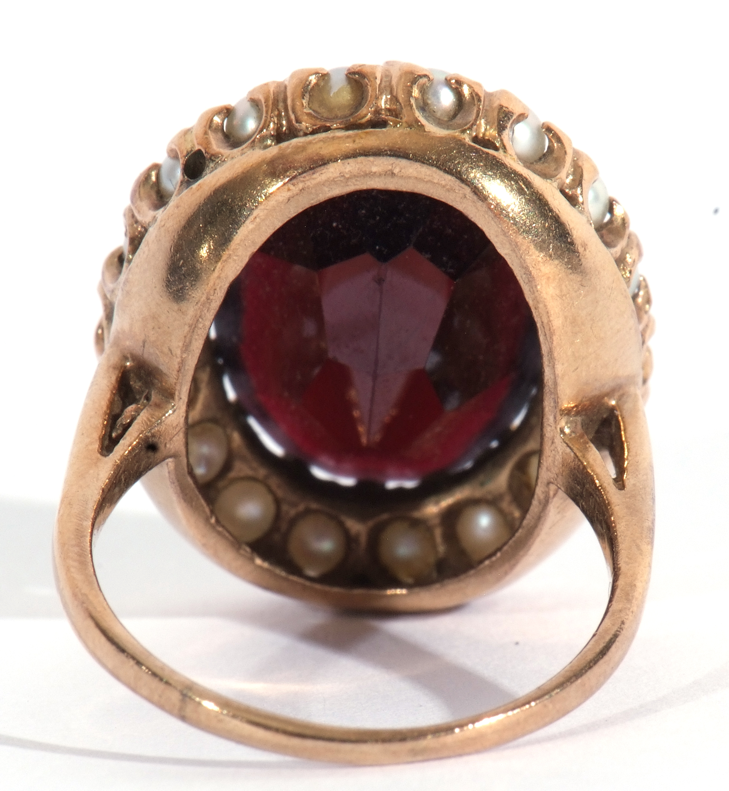 Modern 9ct gold dress ring, a large red paste faceted stone, 18 x 12mm, within a seed pearl - Image 5 of 9