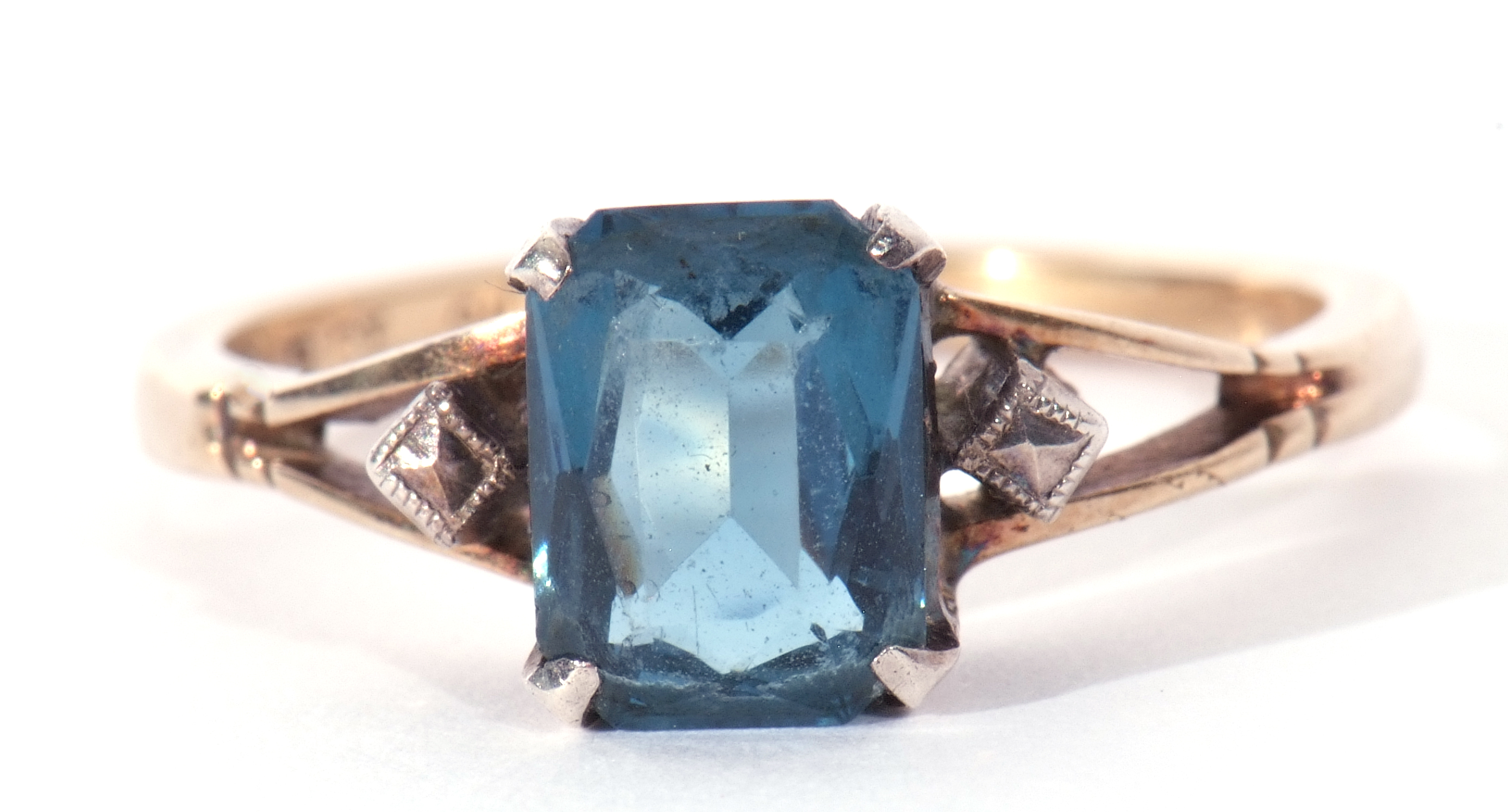 Modern blue stone ring set between two marcasite set shoulders, stamped 9ct and silver, size N - Image 2 of 7