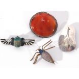Mixed Lot: sterling stamped giraffe brooch, a carnelian stone and white metal brooch, a vintage