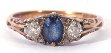 Antique sapphire and diamond three stone ring centring an oval faceted sapphire flanked by two old