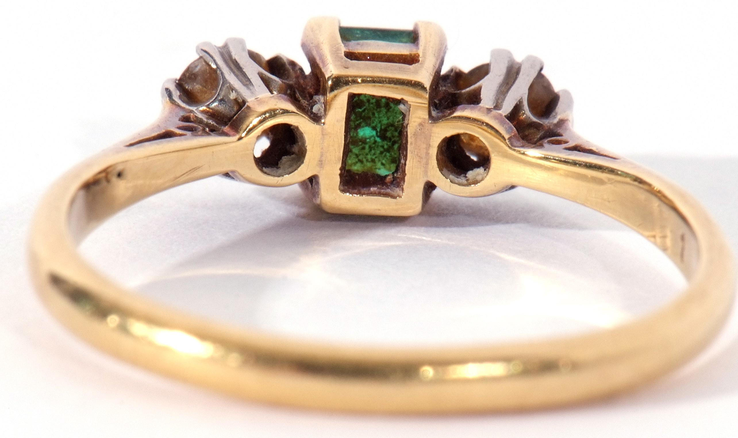 Emerald and diamond three stone ring, the step cut emerald 4.3mm x 3mm, flanked by two round - Image 5 of 9