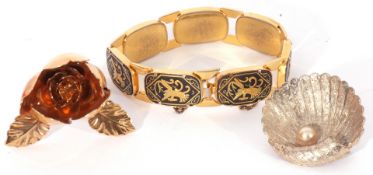 Mixed Lot: Siamese gold plated bracelet, a large clam shell costume brooch, together with a gilt
