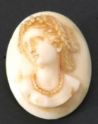 Vintage carved celluloid oval cameo brooch, a head and shoulders profile of a classical lady, 3.5