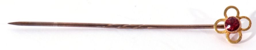 Vintage stick pin, the finial stamped 9c and set with a small ruby, 6cm long