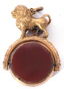 Victorian gold filled swivel fob, the circular fob with bloodstone and carnelian panels, above a