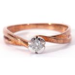 Single stone diamond ring featuring a small brilliant cut diamond, 0.18ct wt total approx, in an