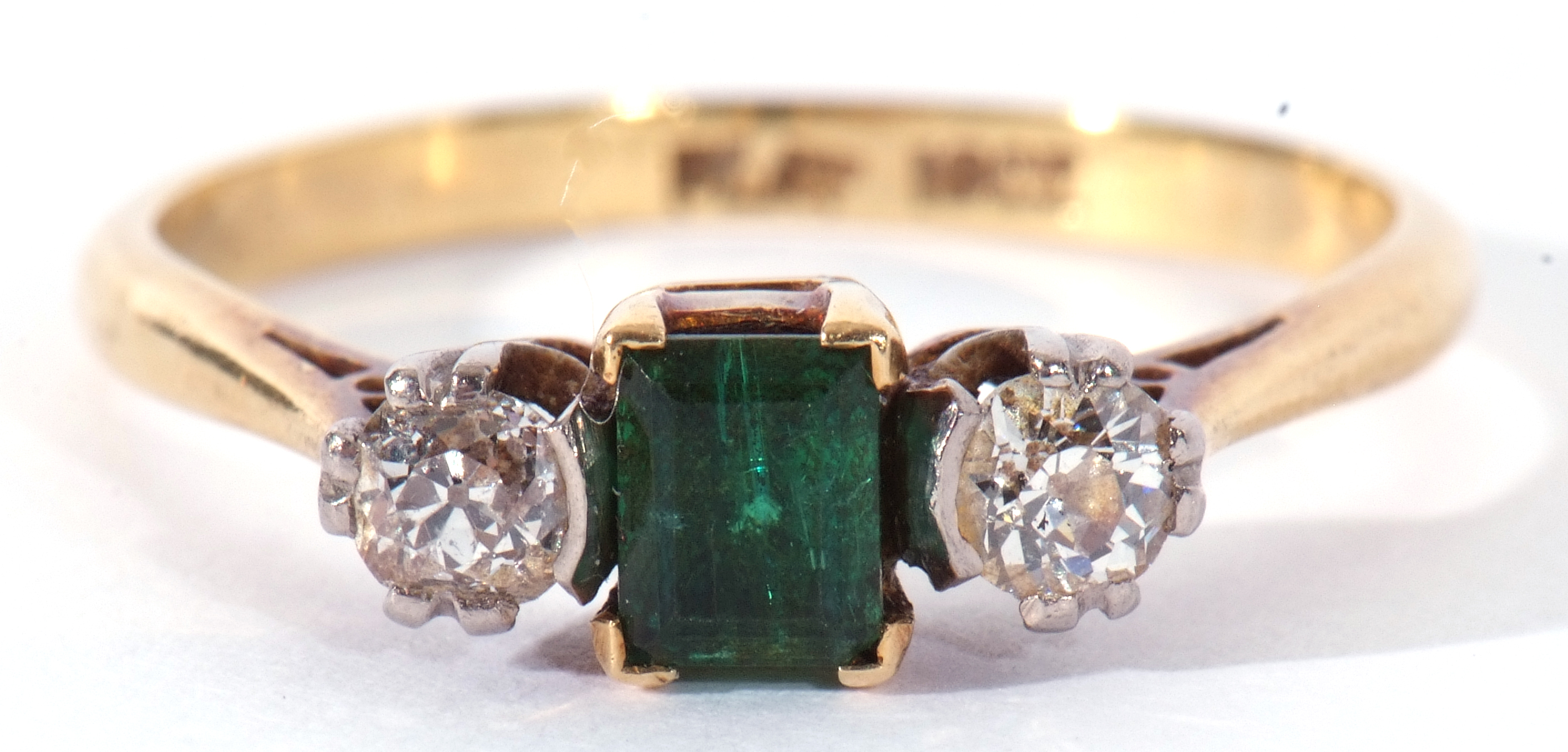 Emerald and diamond three stone ring, the step cut emerald 4.3mm x 3mm, flanked by two round - Image 3 of 9