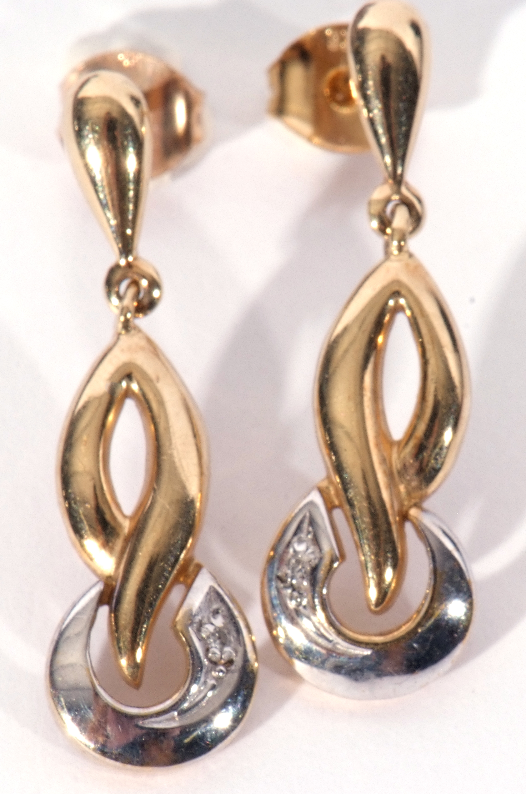 Pair of modern 9ct two-tone gold earrings in a stylised design, each highlighted with a small single - Image 6 of 7