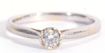 Modern 9ct white gold and single stone diamond ring featuring a round brilliant cut diamond, 0.