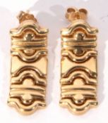 Pair of 750 stamped articulated earrings with post fittings, 25mm long, 7.6gms