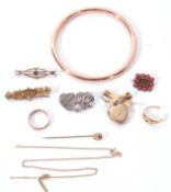 Mixed Lot: 9ct rose gold hollow bangle (7gms), a vintage gold plated Mizpah heart locket suspended