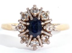 Sapphire and diamond cluster ring, the oval faceted sapphire 6 x 4mm within a round brilliant cut