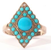 9ct gold, turquoise and seed pearl set ring, the lozenge shaped panel 20 x 15mm centring a round cut