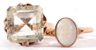 Mixed Lot: modern 9ct gold and pale quartz dress ring, a square step shaped design raised in an