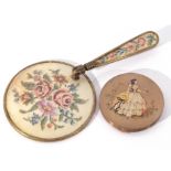 Vintage powder compact and vintage dressing table mirror, the verso with a needlework floral