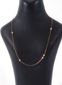 9ct gold small box link chain interspersed with five small seed pearls, 20cm when fastened