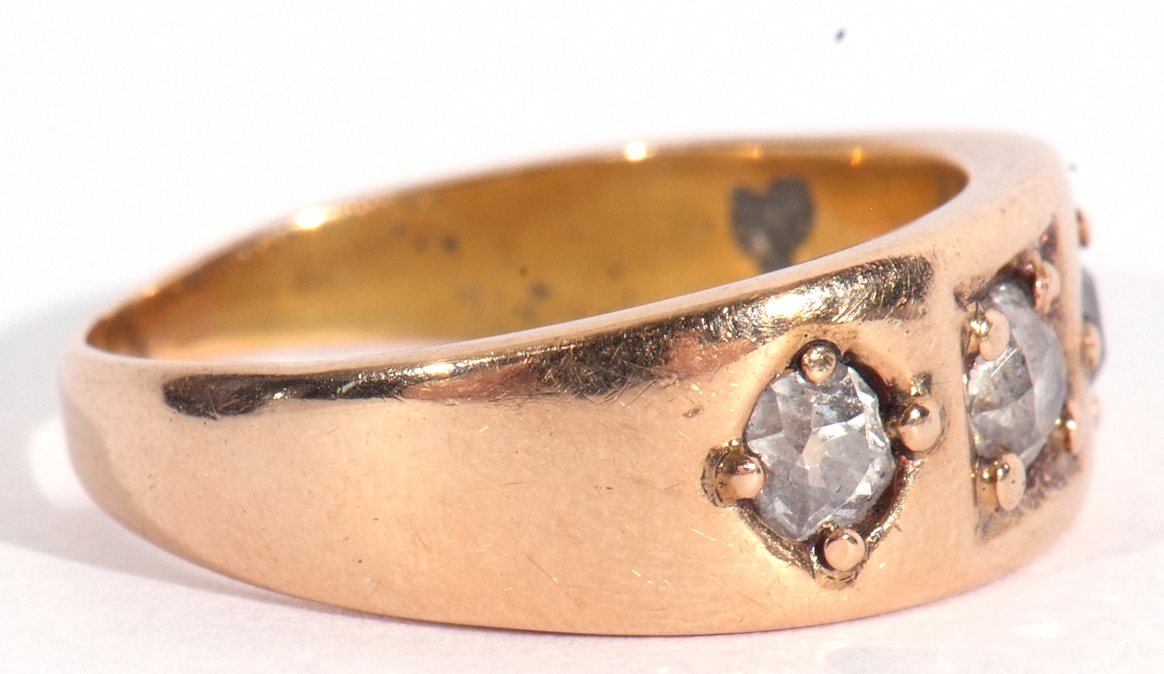 Antique three stone diamond ring featuring three graduated old cut diamonds, each individually in - Image 6 of 7