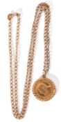 South African 1/10 Krugerrand framed in a 9ct pendant mount suspended from a 9ct gold chain, g/w 6.