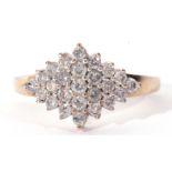 Modern 9ct gold and diamond cluster ring set with 25 small single cut diamonds of lozenge shape,