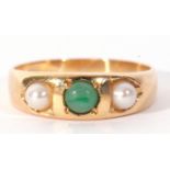 18ct stamped jade and seed pearl ring, centring a small jade bead flanked by two small seed