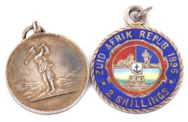 Mixed Lot: enamel coin pendant, "Zuid Afrik Repub 1896" 2 shillings, together with the Artisan