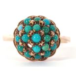 9ct gold turquoise set ring, a dome shaped design set with small cabochon turquoise (one missing),
