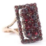 Vintage garnet ring of rectangular shape, 18 x 10mm and decorated with two tiers of graduated