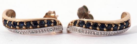 Pair of modern 9ct gold diamond and sapphire shaped half hoop earrings, each with a row of nine