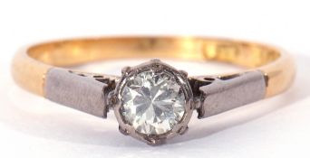 A single stone diamond ring featuring a round brilliant cut diamond of 0.20ct approx, bezel set
