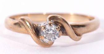 9ct gold single stone diamond ring, a small brilliant cut diamond, 0.15ct approx, raised between