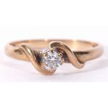 9ct gold single stone diamond ring, a small brilliant cut diamond, 0.15ct approx, raised between