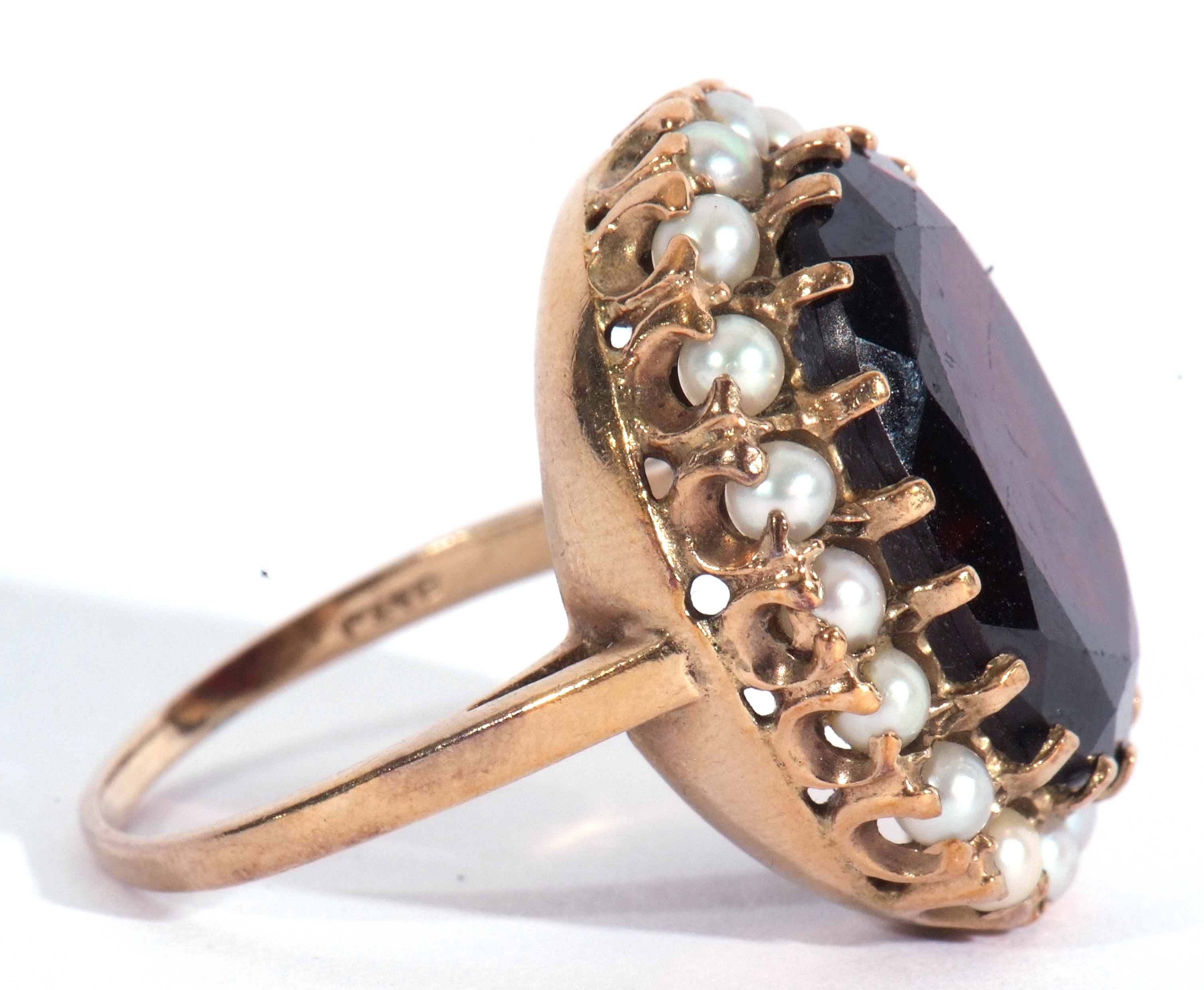 Modern 9ct gold dress ring, a large red paste faceted stone, 18 x 12mm, within a seed pearl - Image 7 of 9