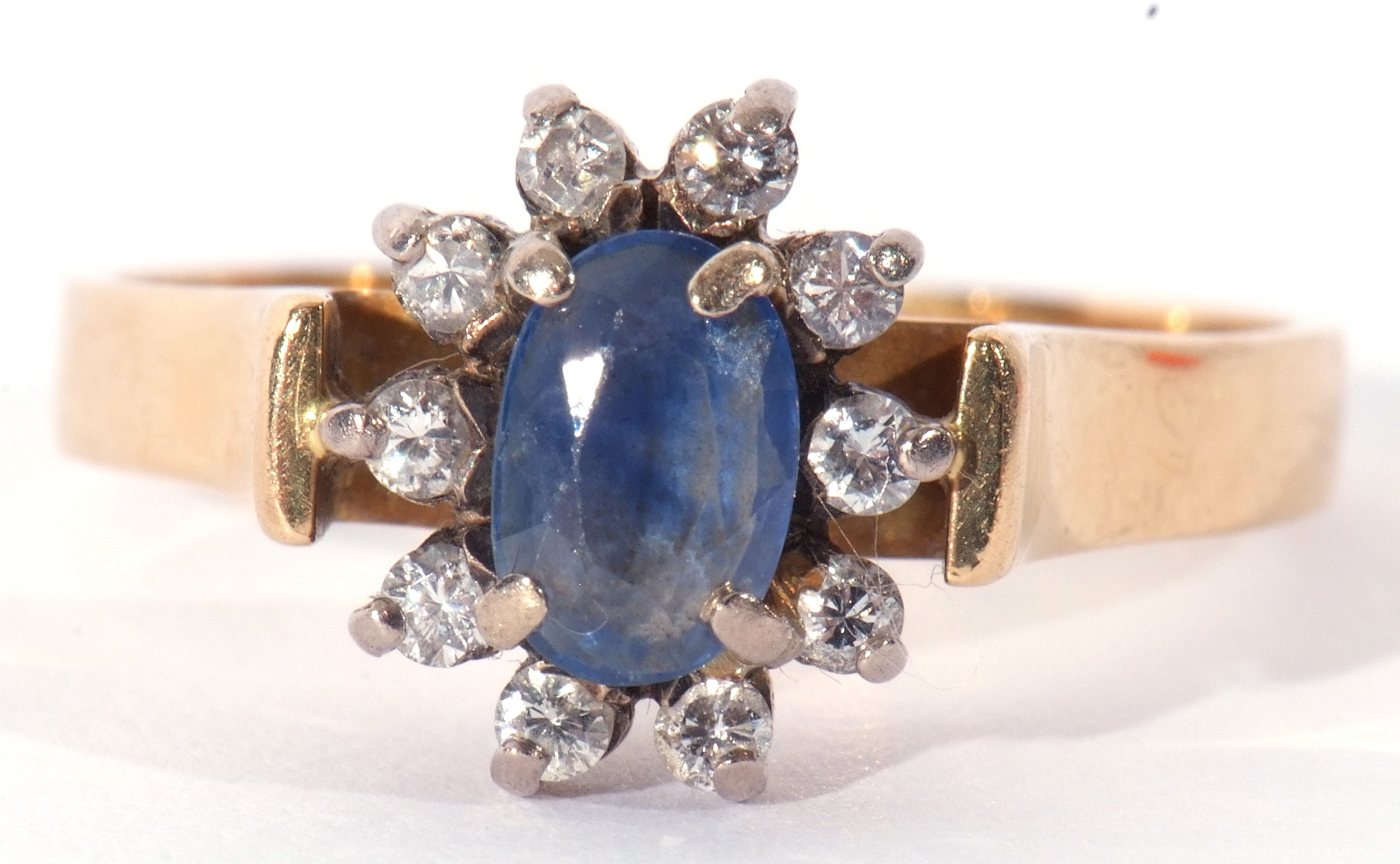 Sapphire and diamond ring, the oval shaped sapphire within a small brilliant cut diamond surround ( - Image 8 of 8