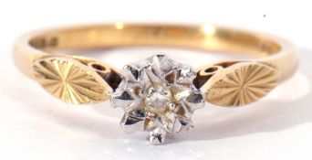 18ct gold single stone ring centring a small single cut diamond in an illusion setting raised