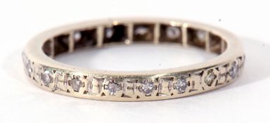 Precious metal and diamond full eternity ring set throughout with small single cut diamonds, size